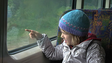 Little girl passenger on train