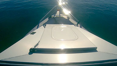 Motor boat bow onboard point-of-view travelling
